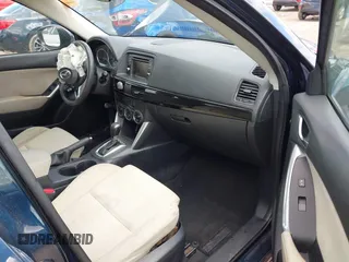 2015 Mazda CX-5 Sport with VIN JM3KE4BY3F0503011, listed as a IAAI auction lot 41973501 with 191,064 mi miles and . Bid and sale history available at carsss.com. Image 5.