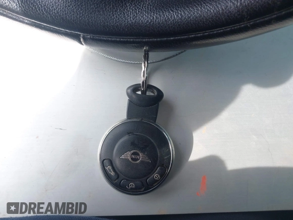 2009 MINI Hardtop S with VIN WMWMF73569TW87929, listed as a IAAI auction lot 42057214 with 164,922 mi miles and . Bid and sale history available at DreamBid. Image 11.