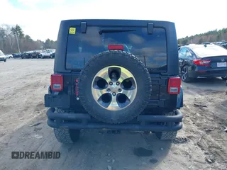 2017 Jeep Wrangler Unlimited Sahara with VIN 1C4BJWEG8HL711566, listed as a IAAI auction lot 42047290 with 147,789 mi miles and . Bid and sale history available at DreamBid. Image 17.