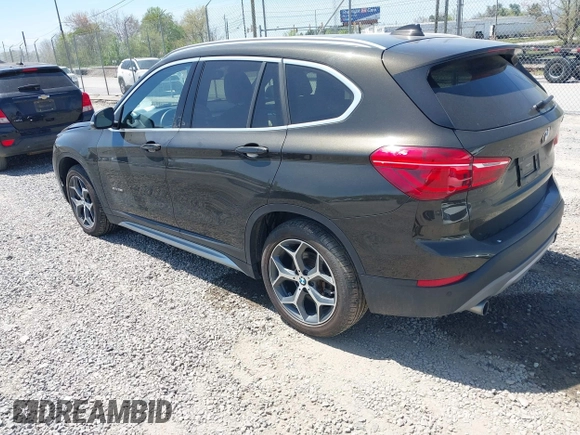 2018 BMW X1 xDrive28i with VIN WBXHT3C39J5F88234, listed as a IAAI auction lot 42044900 with 38,732 mi miles. Bid and sale history available at carsss.com. Image 3.