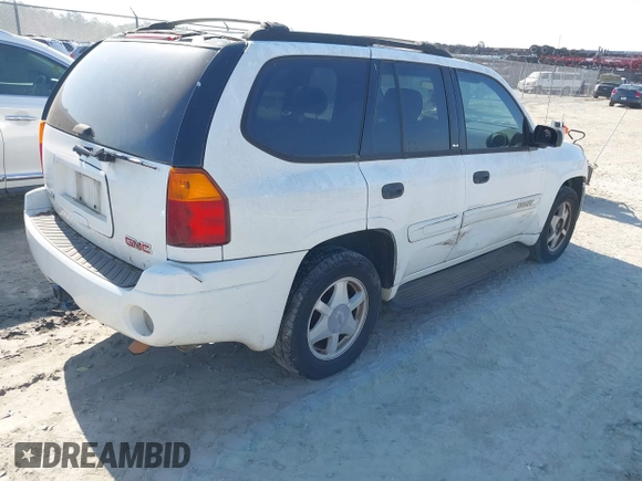 2003 GMC Envoy SLT with VIN 1GKDS13S832300090, listed as a IAAI auction lot 41993627 with 210,631 mi miles. Bid and sale history available at carsss.com. Image 4.
