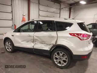 2016 Ford Escape Titanium with VIN 1FMCU9J99GUA61848, listed as a IAAI auction lot 42300324 with 51,692 mi miles and . Bid and sale history available at DreamBid. Image 14.