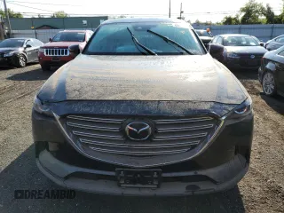 2021 Mazda CX-9 Sport with VIN JM3TCBBY3M0527756, listed as a Copart auction lot 68414324 with Not Provided miles and Salvage Title. Bid and sale history available at DreamBid. Image 5.