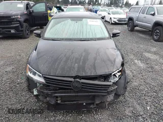 2012 Volkswagen Jetta Sedan SE w/Convenience with VIN 3VWDX7AJ5CM344533, listed as a IAAI auction lot 41805665 with 176,779 mi miles. Bid and sale history available at carsss.com. Image 13.