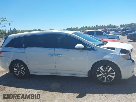 2015 Honda Odyssey Touring Elite with VIN 5FNRL5H96FB090702, listed as a IAAI auction lot 41825889 with 118,157 mi miles and . Bid and sale history available at DreamBid. Image 14.