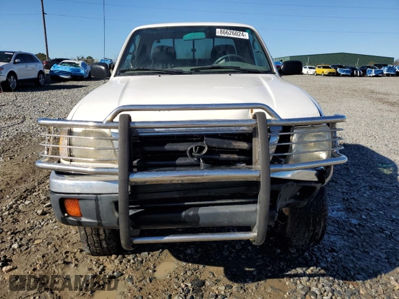 1999 Toyota Tacoma PreRunner with VIN 4TASM92N0XZ559544, listed as a Copart auction lot 86626024 with 209,794 mi miles and Salvage title. Bid and sale history available at DreamBid. Image 5.