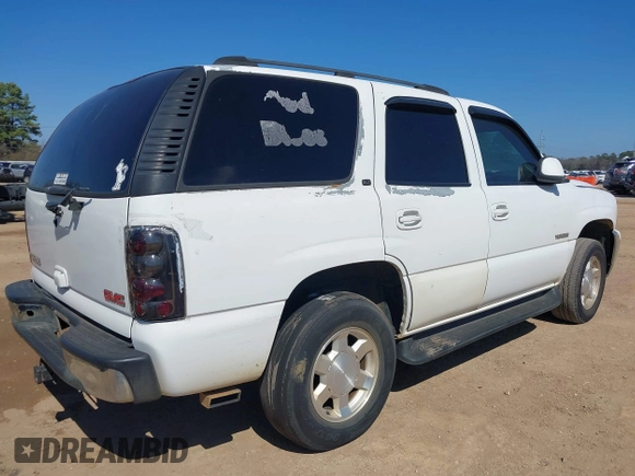 2002 GMC Yukon SLT with VIN 1GKEC13Z02J244875, listed as a IAAI auction lot 41657514 with 329,288 mi miles. Bid and sale history available at carsss.com. Image 4.