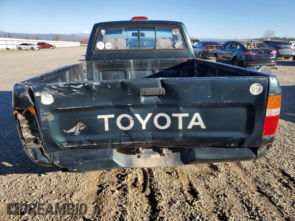 1994 Toyota Pickup z VIN JT4RN81A6R5176565, wystawiony jako Copart lot #86720254 z przebiegiem 200 672 mil mil oraz Szkoda całkowita • Salvage title. Historia ofert i sprzedaży dostępna na DreamBid. Obrazek 6.