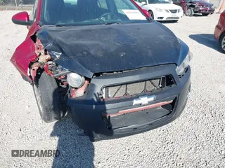 2013 Chevrolet Sonic LT with VIN 1G1JC5SH3D4256507, listed as a IAAI auction lot 42235009 with 117,804 mi miles and . Bid and sale history available at DreamBid. Image 6.