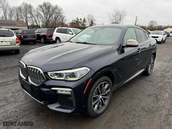 2021 BMW X6 M50i with VIN 5UXCY8C02M9D95172, listed as a Copart auction lot 84796854 with 75,299 mi miles and Clean Title. Bid and sale history available at carsss.com. Image 1.