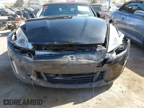 2014 Nissan 370Z Touring with VIN JN1AZ4FH8EM620208, listed as a IAAI auction lot 42094292 with 68,799 mi miles and . Bid and sale history available at DreamBid. Image 6.