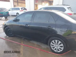 2013 Toyota Corolla L with VIN 2T1BU4EE6DC935978, listed as a IAAI auction lot 42111995 with 200,152 mi miles. Bid and sale history available at carsss.com. Image 14.