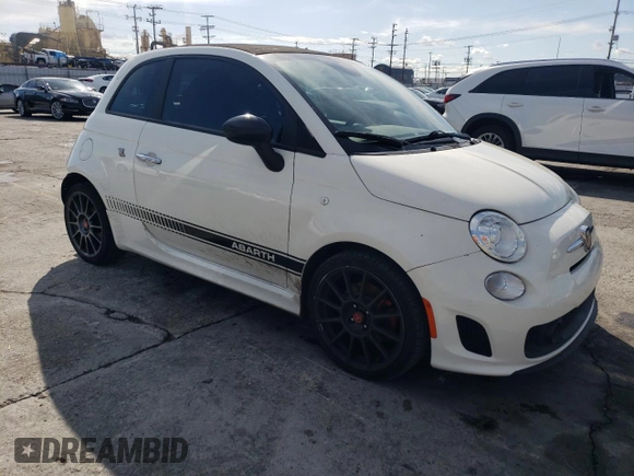 2013 FIAT 500 Abarth with VIN 3C3CFFJH4DT628966, listed as a Copart auction lot 42648685 with 102,045 mi miles and Salvage title. Bid and sale history available at DreamBid. Image 4.