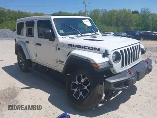 2021 Jeep Wrangler Unlimited Rubicon with VIN 1C4HJXFG5MW586842, listed as a IAAI auction lot 42186683 with 76,450 mi miles and . Bid and sale history available at DreamBid. Image 1.