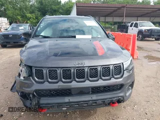 2023 Jeep Compass Trailhawk with VIN 3C4NJDDN9PT544283, listed as a IAAI auction lot 42393021 with 60,009 mi miles and . Bid and sale history available at DreamBid. Image 12.