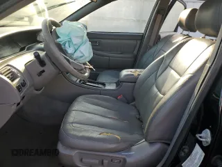 2001 Toyota Avalon XL z VIN 4T1BF28B61U175674, wystawiony jako Copart lot #49913765 z przebiegiem 170 245 mil mil oraz Tytuł czysty. Historia ofert i sprzedaży dostępna na DreamBid. Obrazek 7.