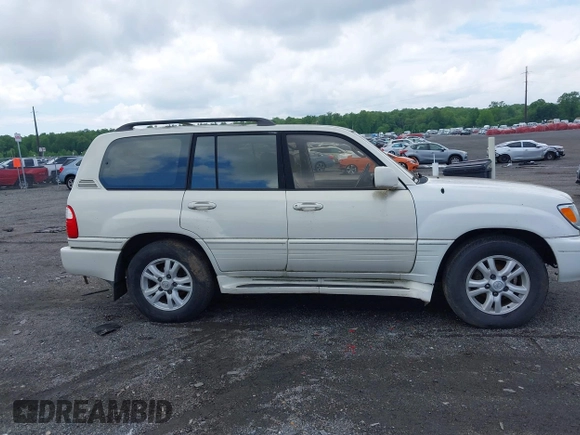 2001 Lexus LX 470 z VIN JTJHT00W613506010, wystawiony jako IAAI lot #42277268 z przebiegiem 186 671 mil mil oraz . Historia ofert i sprzedaży dostępna na DreamBid. Obrazek 13.