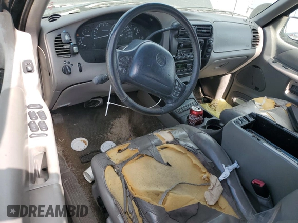 2001 Mercury Mountaineer z VIN 4M2ZU66E41UJ02651, wystawiony jako Copart lot #54207905 z przebiegiem 294 148 mil mil oraz Szkoda całkowita • Salvage title. Historia ofert i sprzedaży dostępna na DreamBid. Obrazek 8.