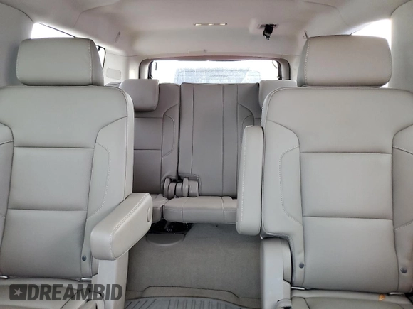 2019 Chevrolet Suburban Premier with VIN 1GNSKJKCXKR154480, listed as a Copart auction lot 77226834 with 24,683 mi miles and Non Repairable. Bid and sale history available at DreamBid. Image 10.