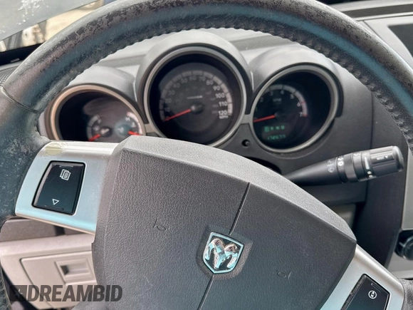 2007 Dodge Nitro SLT z VIN 1D8GU58K77W690568, wystawiony jako Copart lot #61766405 z przebiegiem 177 426 mil mil oraz Czysty tytuł • Clean title. Historia ofert i sprzedaży dostępna na DreamBid. Obrazek 9.