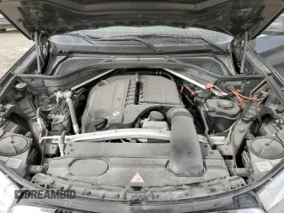 2015 BMW X5 xDrive35i z VIN 5UXKR0C56F0P10422, wystawiony jako Copart lot #49214395 z przebiegiem 115 374 mil mil oraz Szkoda całkowita • Salvage title. Historia ofert i sprzedaży dostępna na DreamBid. Obrazek 12.