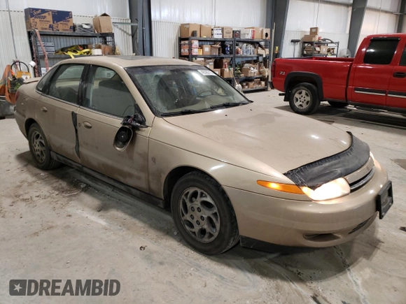 2002 Saturn LS z VIN 1G8JU54F62Y528998, wystawiony jako Copart lot #48390715 z przebiegiem 249 471 mil mil oraz Szkody całkowita. Historia ofert i sprzedaży dostępna na DreamBid. Obrazek 4.