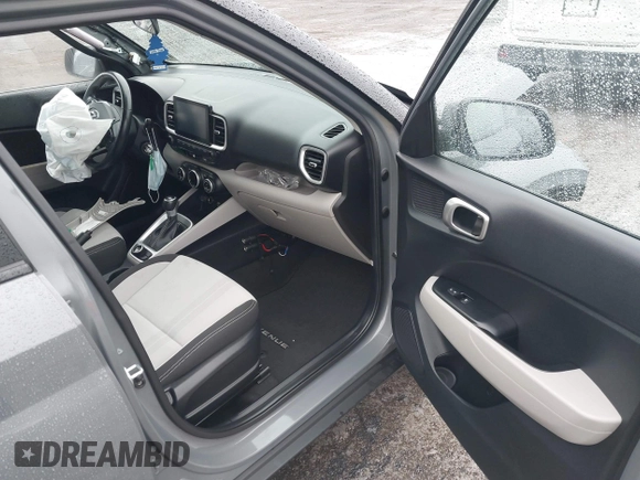 2021 Hyundai Venue Denim z VIN KMHRC8A38MU098601, wystawiony jako IAAI lot #41475810 z przebiegiem 132 647 mil mil oraz . Historia ofert i sprzedaży dostępna na DreamBid. Obrazek 5.