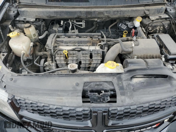 2019 Dodge Journey SE z VIN 3C4PDCBB1KT798081, wystawiony jako Copart lot #58491395 z przebiegiem 102 740 mil mil oraz Szkoda całkowita • Salvage title. Historia ofert i sprzedaży dostępna na DreamBid. Obrazek 12.