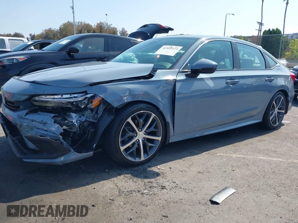 2023 Honda Civic Touring with VIN 2HGFE1F92PH322377, listed as a IAAI auction lot 42361473 with 43,533 mi miles and . Bid and sale history available at DreamBid. Image 16.