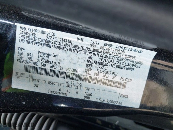 2012 Ford Focus Titanium with VIN 1FAHP3J2XCL369554, listed as a IAAI auction lot 42072931 with 95,474 mi miles. Bid and sale history available at carsss.com. Image 9.