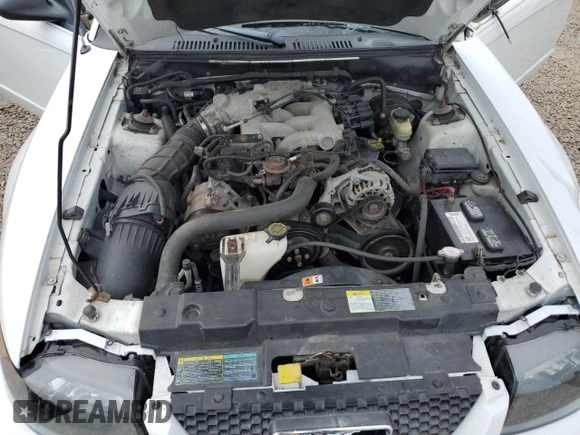 2004 Ford Mustang Deluxe with VIN 1FAFP446X4F238670, listed as a Copart auction lot 60922635 with 121,880 mi miles and Salvage title. Bid and sale history available at DreamBid. Image 11.