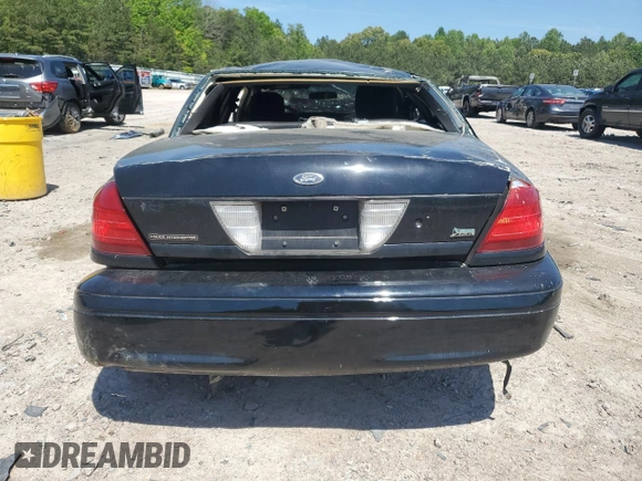 2011 Ford Police Interceptor with VIN 2FABP7BV2BX105686, listed as a Copart auction lot 54908935 with Not provided miles and Salvage title. Bid and sale history available at DreamBid. Image 6.