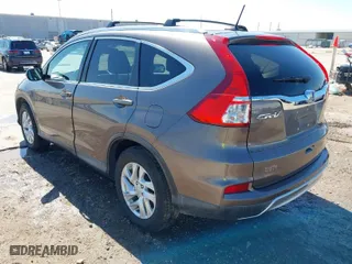2015 Honda CR-V EX-L with VIN 2HKRM3H7XFH519437, listed as a IAAI auction lot 41656984 with 143,107 mi miles. Bid and sale history available at carsss.com. Image 3.