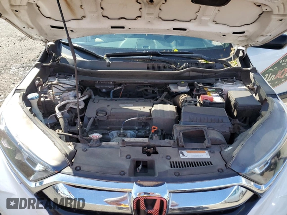 2019 Honda CR-V LX z VIN 5J6RW6H35KL004807, wystawiony jako Copart lot #51943275 z przebiegiem 119 862 mil mil oraz Szkoda całkowita • Salvage title. Historia ofert i sprzedaży dostępna na DreamBid. Obrazek 12.