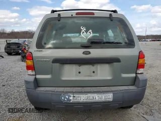 2005 Ford Escape XLS Value z VIN 1FMYU92Z05KA21168, wystawiony jako Copart lot #47630185 z przebiegiem 253 389 mil mil oraz Szkoda całkowita • Salvage title. Historia ofert i sprzedaży dostępna na DreamBid. Obrazek 6.