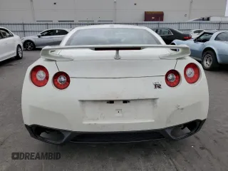 2009 Nissan GT-R Premium z VIN JN1AR54F19M251138, wystawiony jako Copart lot #63123824 z przebiegiem 37 758 mil mil oraz Szkoda całkowita • Salvage title. Historia ofert i sprzedaży dostępna na DreamBid. Obrazek 6.