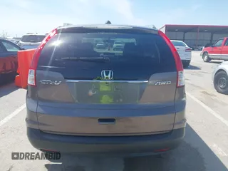 2014 Honda CR-V EX-L with VIN 5J6RM4H70EL096555, listed as a IAAI auction lot 42038062 with 113,601 mi miles. Bid and sale history available at carsss.com. Image 16.