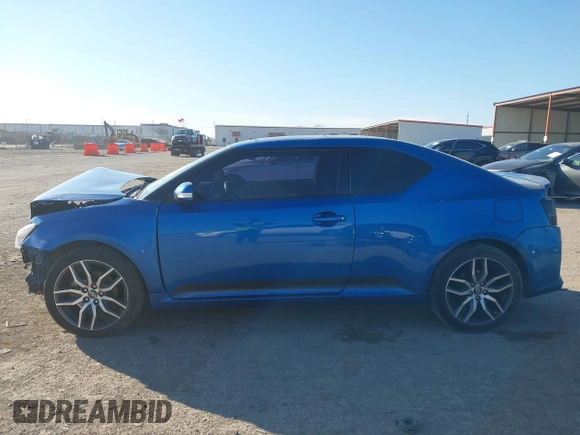 2014 Scion tC with VIN JTKJF5C78E3079618, listed as a IAAI auction lot 41107330 with 112,105 mi miles. Bid and sale history available at carsss.com. Image 15.