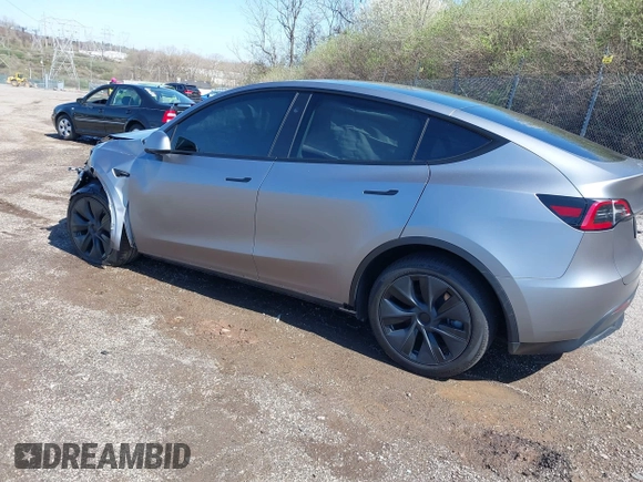 2024 Tesla Model Y Long Range with VIN 7SAYGDEE2RA311261, listed as a IAAI auction lot 41534010 with Not Provided miles and . Bid and sale history available at DreamBid. Image 3.