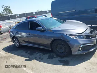 2020 Honda Civic LX with VIN 2HGFC2F67LH551651, listed as a IAAI auction lot 41861966 with 205,619 mi miles and . Bid and sale history available at DreamBid. Image 13.