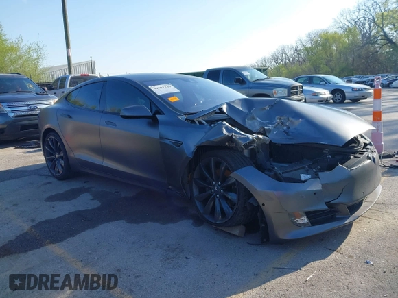 2016 Tesla Model S 90D with VIN 5YJSA1E43GF115310, listed as a IAAI auction lot 42002240 with 108,172 mi miles and . Bid and sale history available at DreamBid. Image 1.