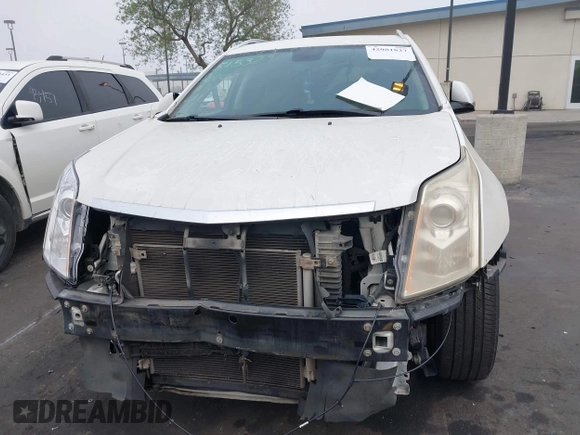 2012 Cadillac SRX Premium Collection с VIN 3GYFNCE33CS554561, выставлен на аукционе IAAI как лот 42081827 с пробегом 132 837 миль миль и . История ставок и продаж доступна на DreamBid. Изображение 13.