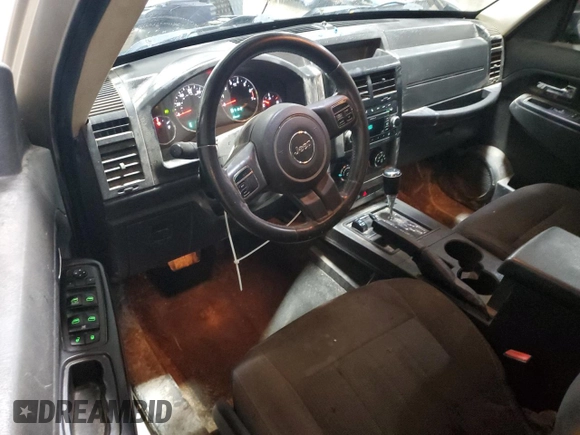 2011 Jeep Liberty Sport with VIN 1J4PN2GK0BW594294, listed as a Copart auction lot 84215214 with 206,515 mi miles and Salvage Title. Bid and sale history available at DreamBid. Image 8.