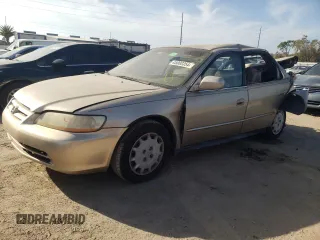 2001 Honda Accord LX with VIN 1HGCG554X1A012316, listed as a Copart auction lot 45000354 with 178,721 mi miles and Salvage title. Bid and sale history available at DreamBid. Image 1.