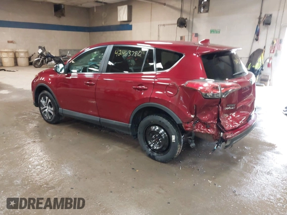 2018 Toyota RAV4 LE with VIN 2T3BFREV9JW825953, listed as a IAAI auction lot 42463780 with 74,128 mi miles and . Bid and sale history available at DreamBid. Image 3.