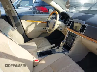 2012 Lincoln MKZ with VIN 3LNHL2GC4CR802198, listed as a IAAI auction lot 41703450 with 107,397 mi miles. Bid and sale history available at carsss.com. Image 5.