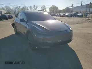 2024 Tesla Model Y with VIN 7SAYGDED7RF108604, listed as a Copart auction lot 48384825 with 24,603 mi miles and Salvage Title. Bid and sale history available at DreamBid. Image 11.