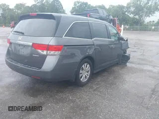 2017 Honda Odyssey SE with VIN 5FNRL5H3XHB026595, listed as a IAAI auction lot 39631978 with 92,555 mi miles and . Bid and sale history available at carsss.com. Image 4.