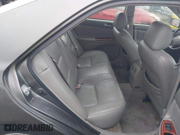 2005 Toyota Camry LE with VIN 4T1BF32K25U595176, listed as a IAAI auction lot 41932171 with 203,956 mi miles and . Bid and sale history available at DreamBid. Image 8.