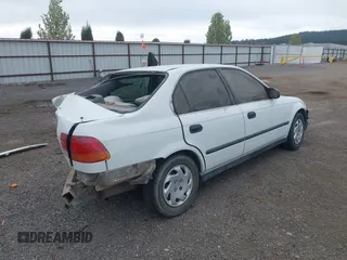 1998 Honda Civic DX with VIN 2HGEJ6629WH551418, listed as a IAAI auction lot 42137262 with 180,704 mi miles. Bid and sale history available at carsss.com. Image 4.